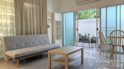 Sammakorn Village | Modern 1 Bed Apartment with Patio