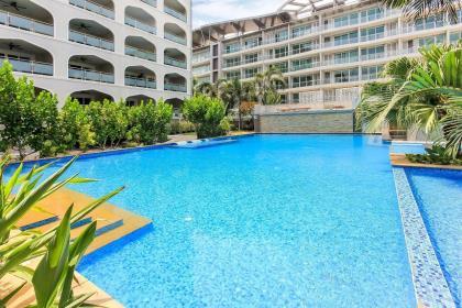 High quality corner unit facing the pool!