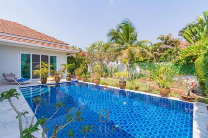 Modern 3 Bed Pool Villa next to feature lake and island. 
